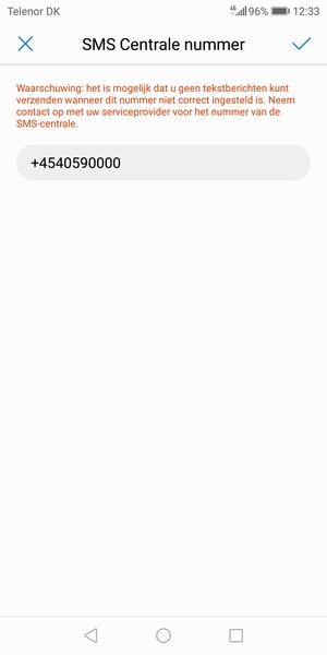Voer het SMS Centrale nummer in en selecteer OK