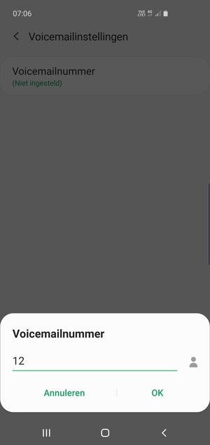 Voer het Voicemailnummer in en selecteer OK