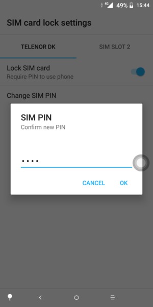 Confirm your new SIM PIN and select OK