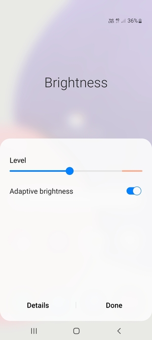 Turn on Adaptive brightness and select Done