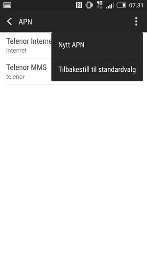 Velg menyknappen og velg Tilbakestill til standardvalg