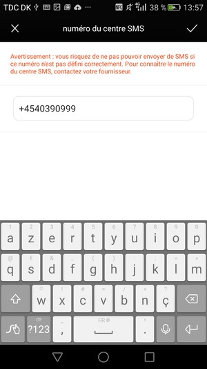 Saisissez le Numéro du centre SMS et sélectionnez OK