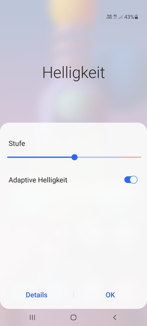 Schalten Sie Adaptive Helligkeit ein und wählen Sie OK