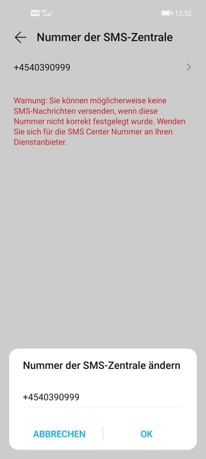 Geben Sie die Nummer der SMS-Zentrale ein und wählen Sie OK