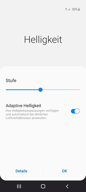 Schalten Sie Adaptive Helligkeit ein und wählen Sie OK