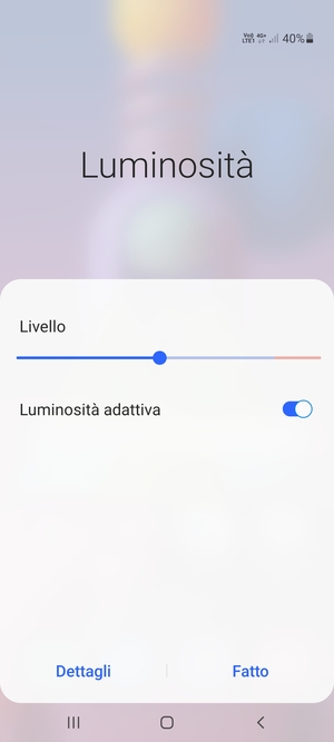 Attiva Luminosità adattiva e seleziona Fatto