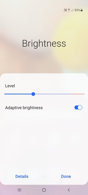 Turn on Adaptive brightness and select Done