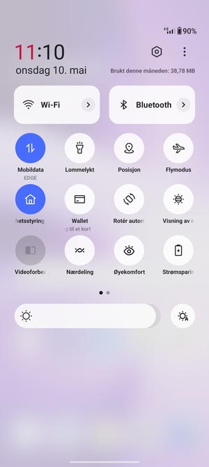 Velg Automatisk lysstyrke