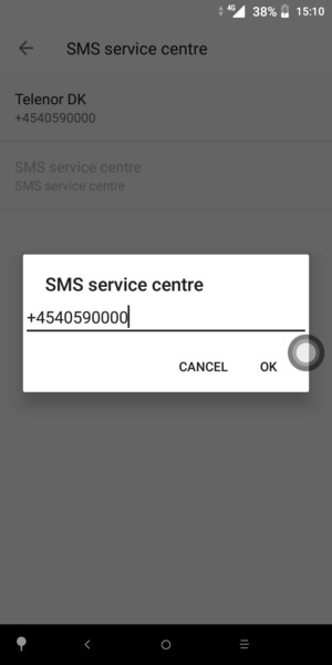 Enter the SMS service centre number and select OK