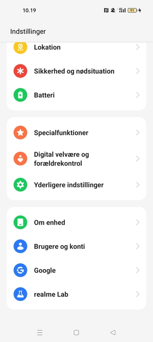 Scroll til og vælg Om enhed