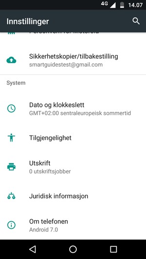 Bla til og velg Om telefonen