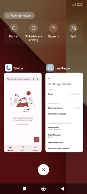 Velg sletteikonet for å lukke alle programmer som kjører