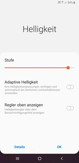 Schalten Sie Adaptive Helligkeit ein und wählen Sie OK