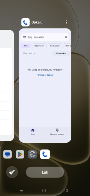 Vælg Luk for at lukke alle åbne apps