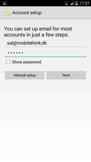 Enter your E-mail address and password. Select Next
