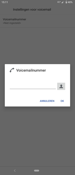 Voer het Voicemailnummer in en selecteer OK