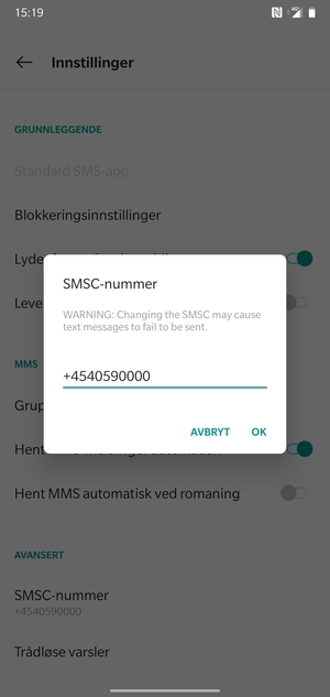Skriv inn SMSC-nummer og velg OK