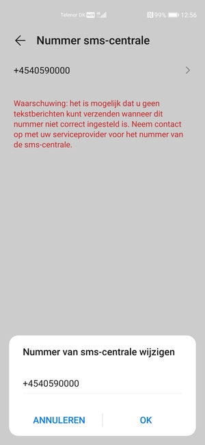 Voer het Nummer sms-centrale in en selecteer OK