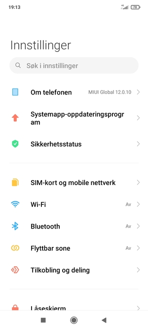 Velg Om telefonen