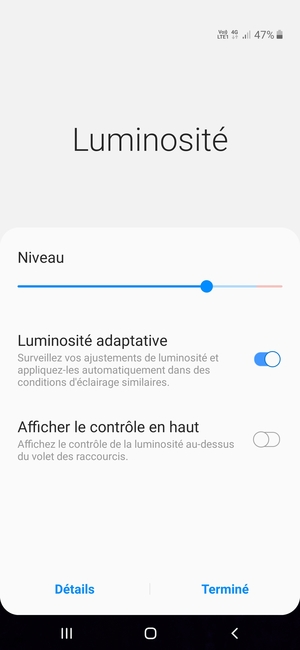 Activez l'Luminosité adaptative et sélectionnez Terminé