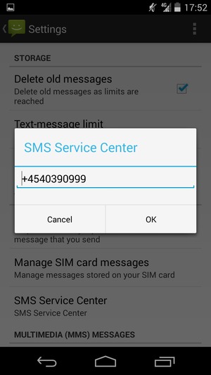 Enter the SMS Service Center number and select OK
