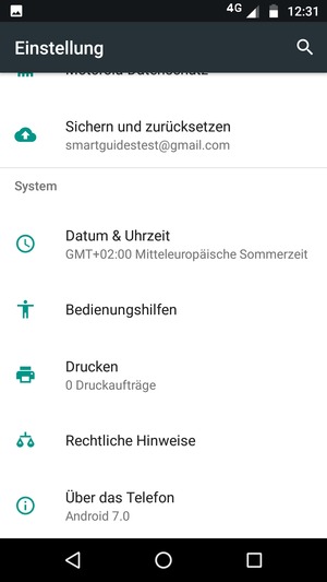 Scrollen Sie und wählen Sie Über das Telefon