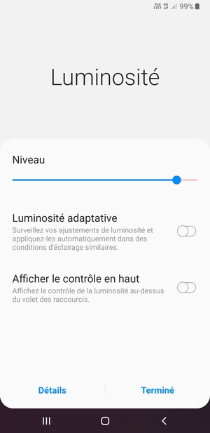 Activez l'Luminosité adaptative et sélectionnez Terminé