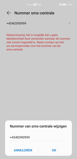 Voer het Nummer van sms-centrale in en selecteer OK