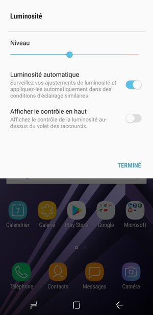 Activez l'Luminosité automatique et sélectionnez TERMINÉ