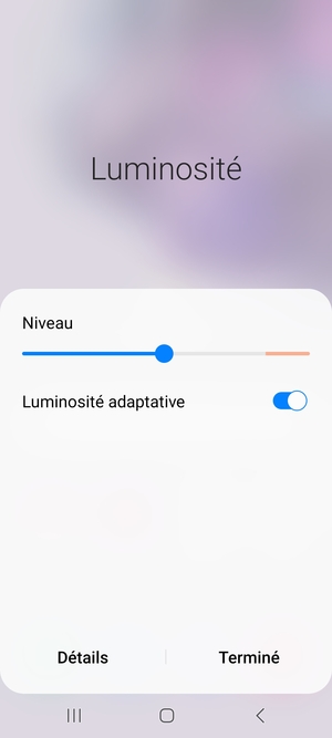 Activez l'Luminosité adaptative et sélectionnez Terminé