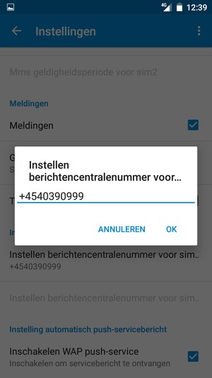 Voer het Berichtencentralenummer in en selecteer OK