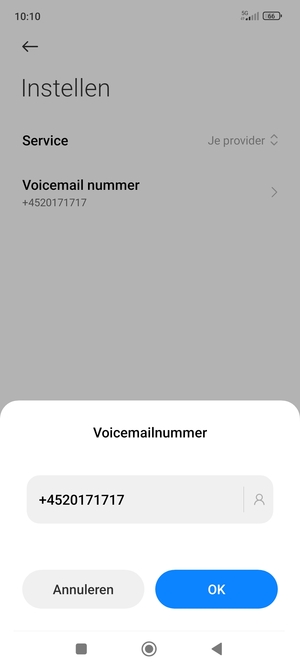 Voer het Voicemail nummer in en selecteer OK