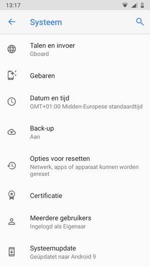 Scroll naar en selecteer Systeemupdate