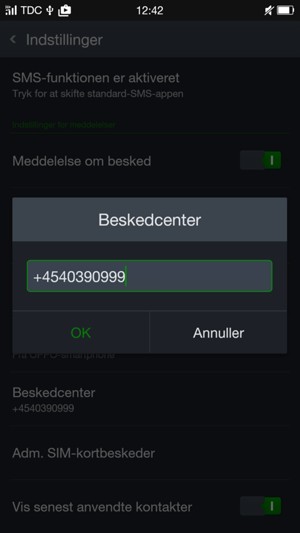 Indtast Beskedcenter nummeret og vælg OK