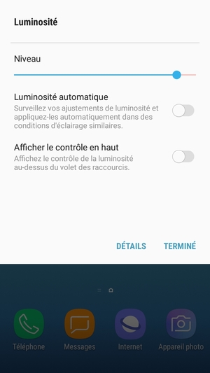 Activez l'Luminosité automatique et sélectionnez TERMINÉ