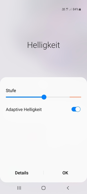 Schalten Sie Adaptive Helligkeit ein und wählen Sie OK