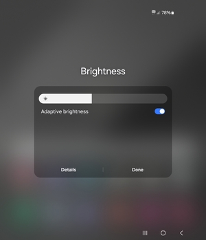 Turn on Adaptive brightness and select Done