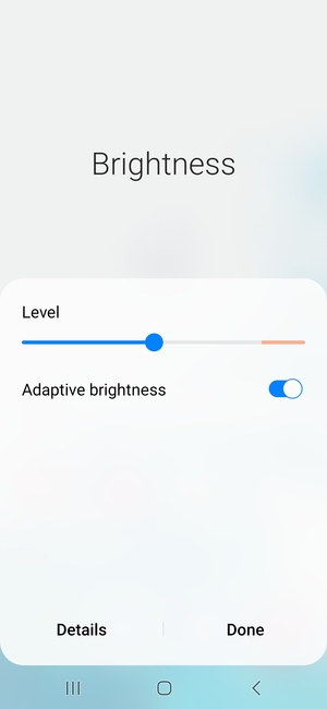 Turn on Adaptive brightness and select Done