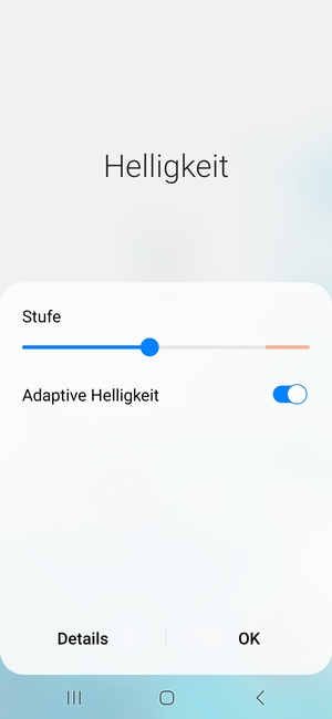 Schalten Sie Adaptive Helligkeit ein und wählen Sie OK