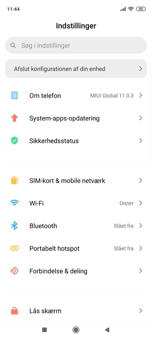 Vælg Om telefonen